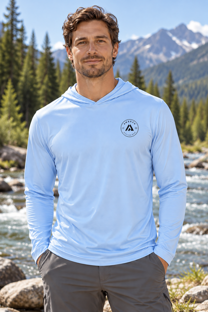 AI-generated lifestyle mockup: Light Blue Waypoint hooded shirt with approximately two-inch round Awaken chest logo