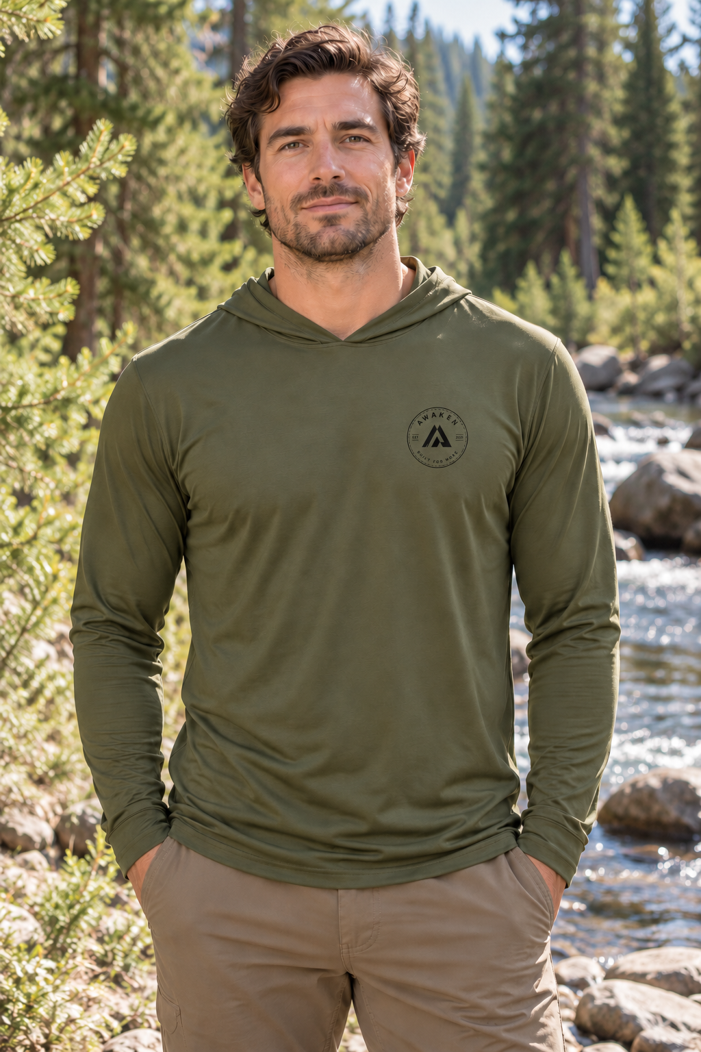 AI-generated lifestyle mockup: Olive Waypoint hooded shirt with approximately two-inch round Awaken chest logo