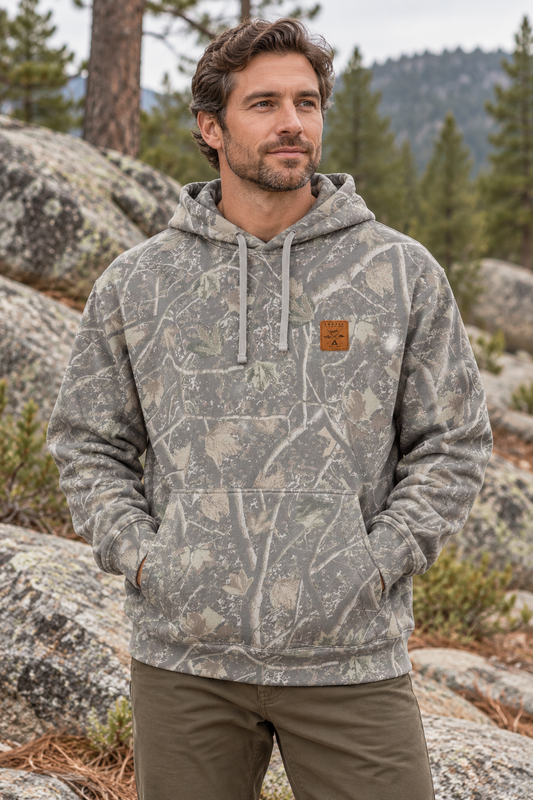 AI-generated lifestyle mockup: Sawtooth Timber Hoodie on a model